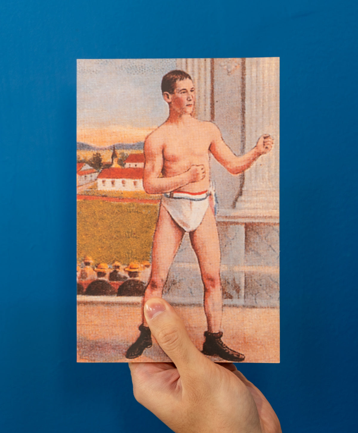 Why Stoics Box and Other Essays on Art and Society cover held against a blue wall