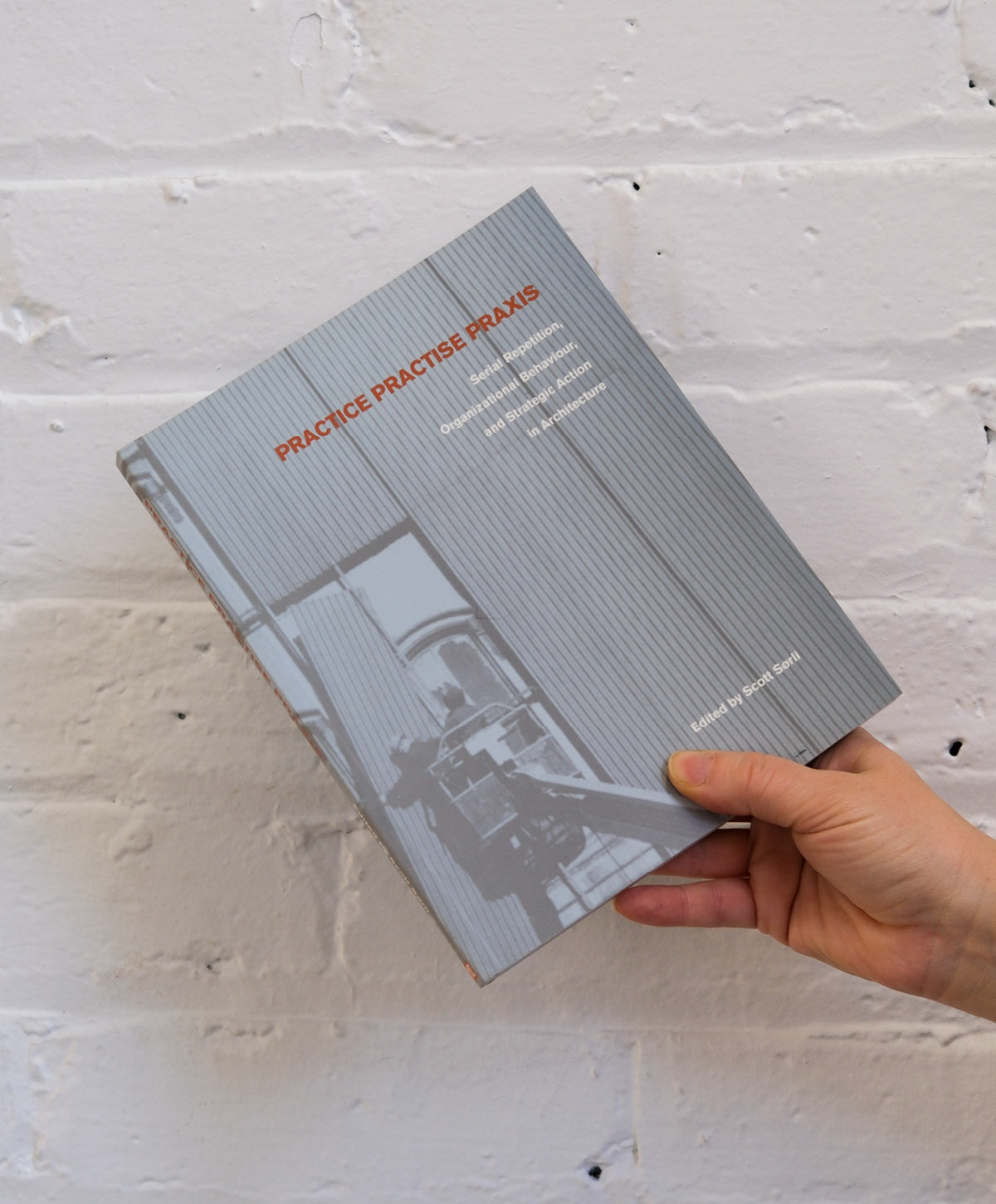 Book cover help agains white brick