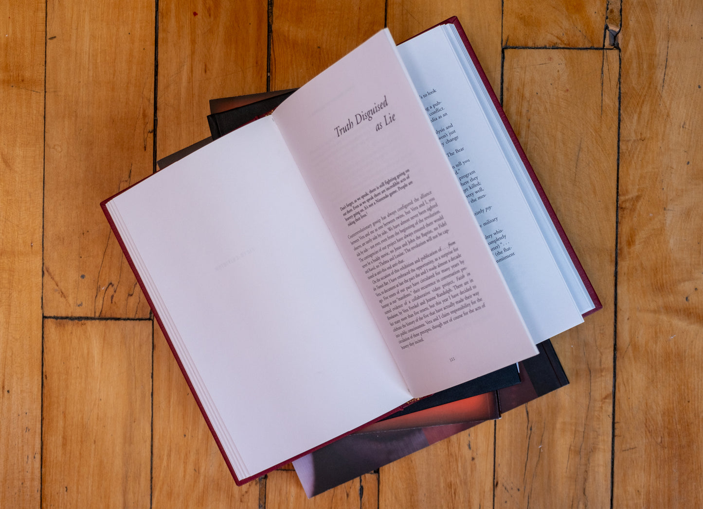 Open book on a wooden surface