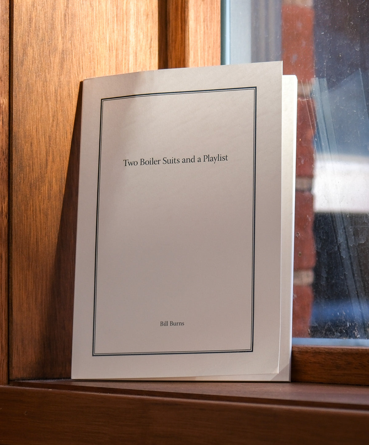 Book cover on a windowsill